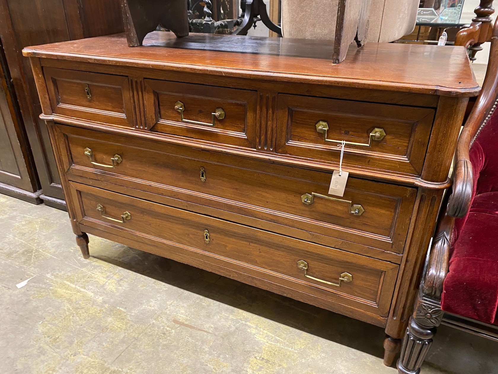 A 19th century French oak commode, width 130cm, depth 60cm, height 84cm